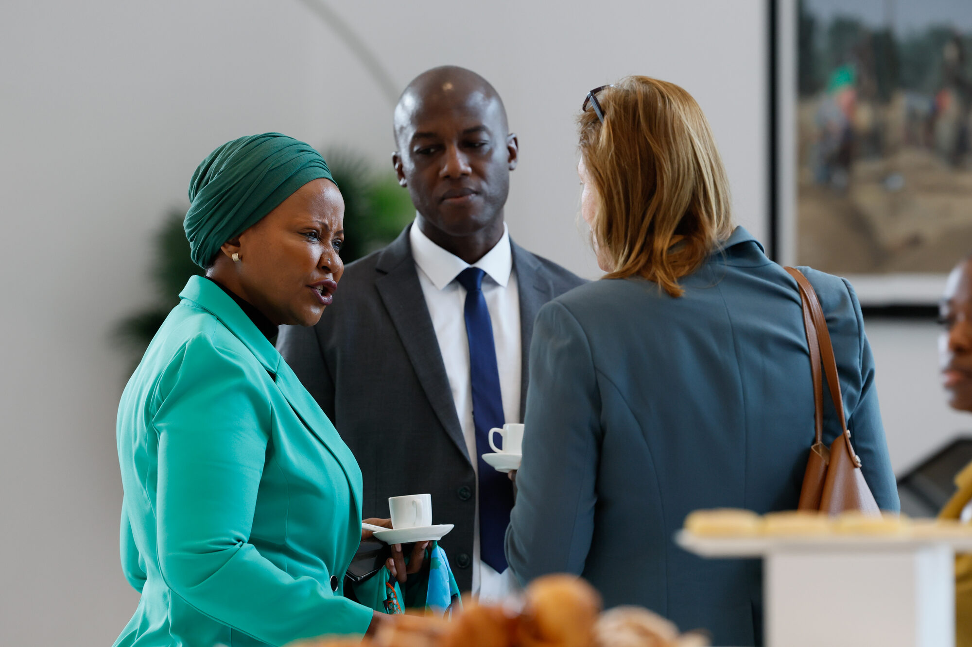 Delegates networking in the foyer